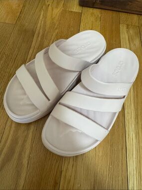 CROCS Triple Strap Slide Sandals in Light Pink